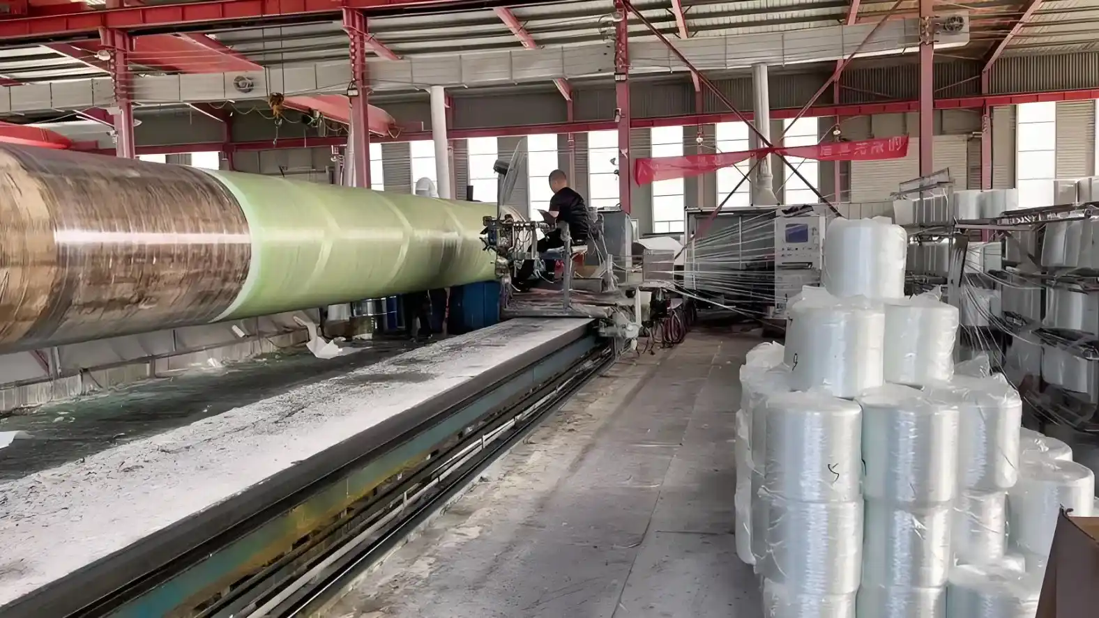 GRP pipe manufacturing process in action